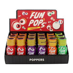 on voit sur un fond blanc un présentoir en carton de plusieurs flacons de poppers dont le nom est Fun pop's. Le carton est noir et rouge avec des yeux dans le style cartoon, il y a des flacons de poppers rouge, violet orange et vert.