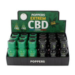 on voit sur un fond blanc un présentoir en carton noir et vert foncé de flacons de poppers. Le nom est poppers extrem CBD et on voit des flacons verts et des flacons noirs.